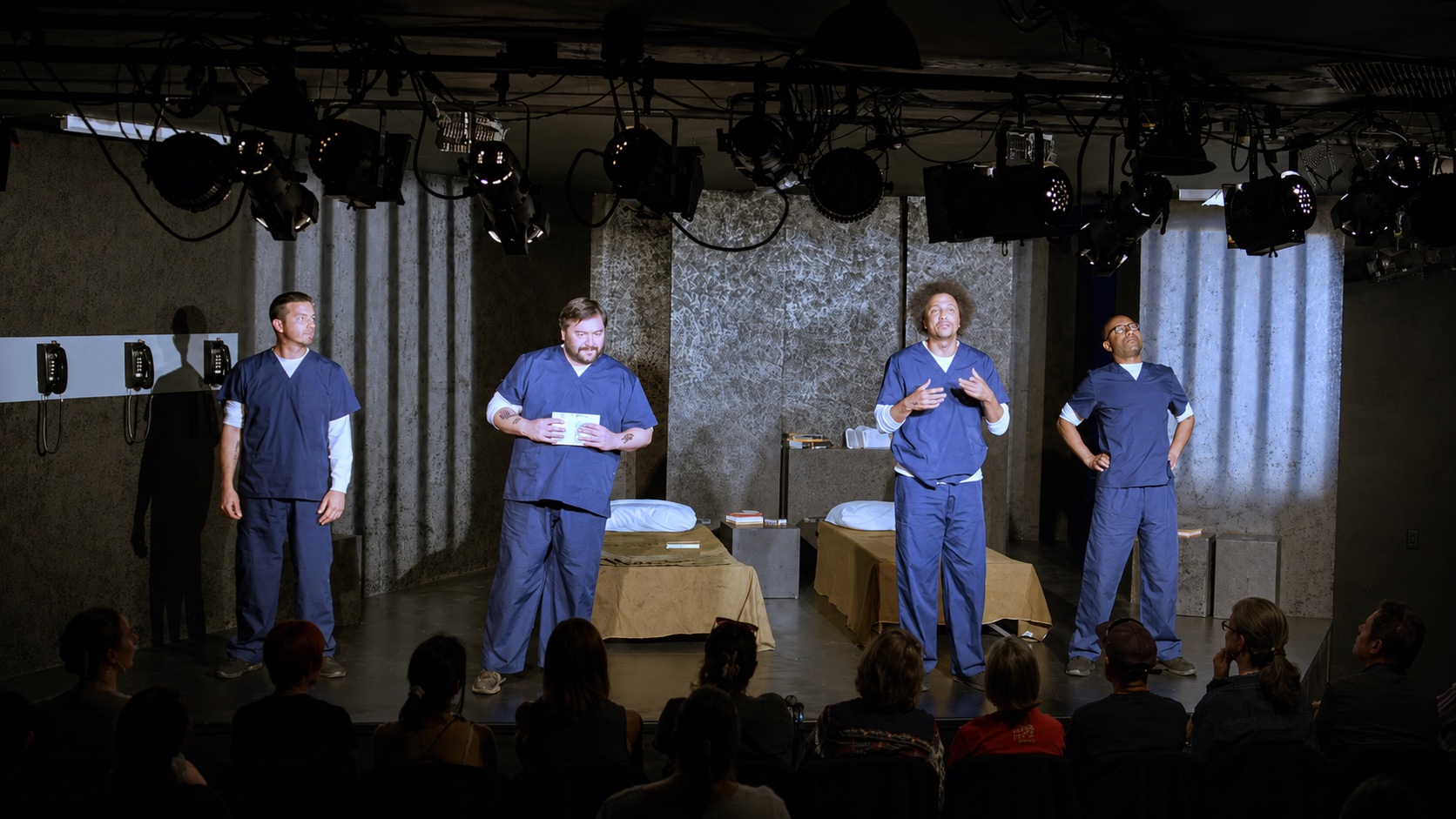The cast performing on stage